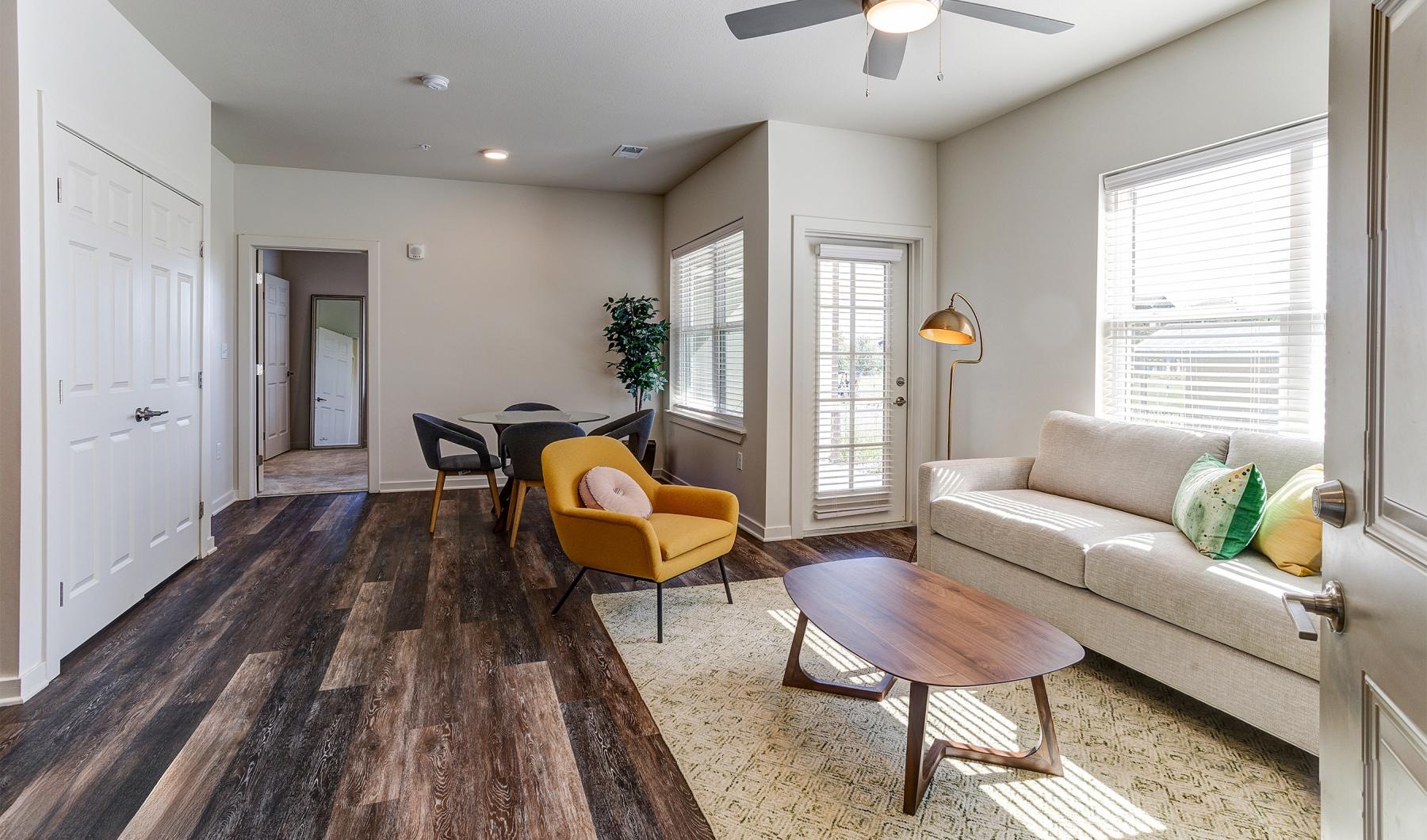 a living room with a couch and a table